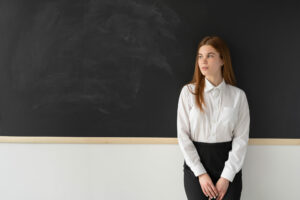 Teacher looking distressed due to workplace bullying